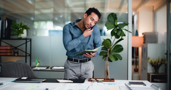 Man, phone call and writing in notebook at office, documents or report at investment company. Person, broker and financial advisor on smartphone for insight, feedback or talk with checklist at agency
