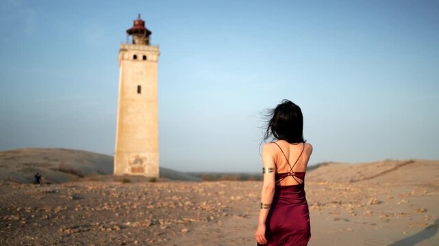 Aerial view of the giant sand dunes with the famous lighthouse on the top of a hill. Rubjerg Knude Lighthouse, , North SeaRubjerg , Sunset at the lighthouse Rubjerg Knude Fyr near Lokken in Denmark. 