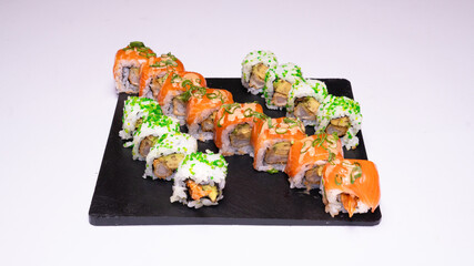 High-quality photo of an assorted sushi set. Photographed on a clean white background, ideal for use in restaurant menus, food blogs, Japanese cuisine promotions and advertising.