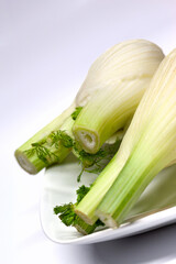 Close up of a green vegetable on a white background