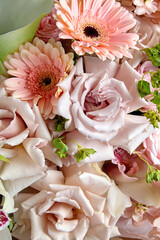 a fragment of a bouquet of delicate pink flowers.