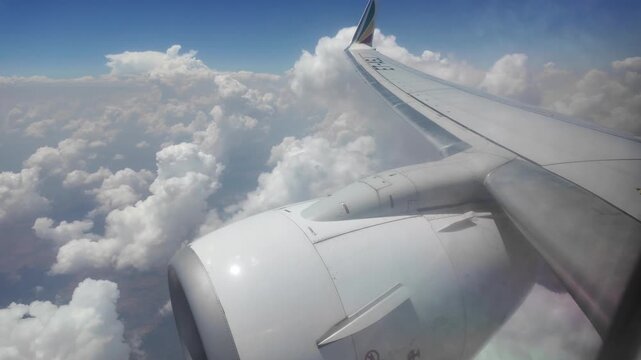 Lilongwe Malawi Africa. 01.12.2025. Video. Aircraft in flight showing engine and wing with winglet preparing to land at Lilongwe Malawi.