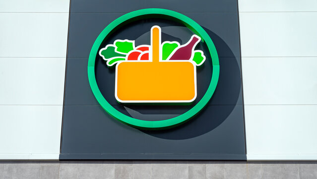 Seville, Spain; February 15, 2025: Mercadona supermarket store logo sign on facade.