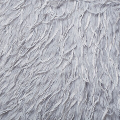 Close-up of feathered fabric in gray tones. Fabric texture: feathers.