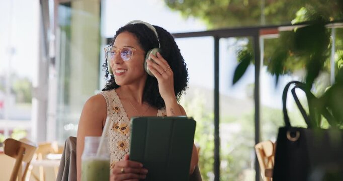 Happy woman, headphones or listening with tablet in cafe for music, song playlist or audio streaming. Female person, customer or dancing with technology for sound app or entertainment in coffee shop