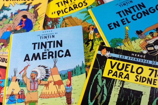 Valencia, Spain - December 10, 2025: Comics featuring Tintin, characters, vibrant colors, copy space, blurred background
