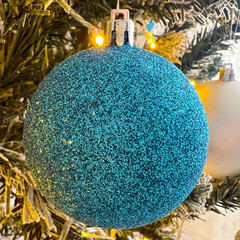 Blue Glitter Christmas Ornament ball Hanging on Tree