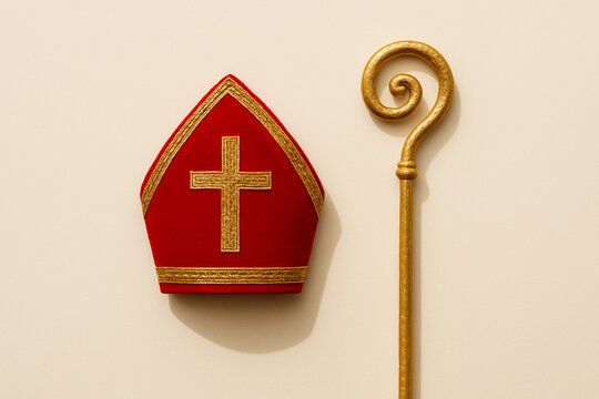 Minimal Saint Nicholas Day Concept with Red Mitre and Golden Staff on Clean Background, 5 or 6 December ,