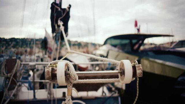 Close up of sailboat rigging and ropes in a marina in the South of France