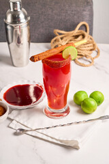 Homemade Michelada with Beer and  clamato, cocktail from mexico