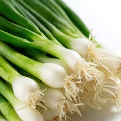 Fresh green onions arranged neatly with vibrant stalks and crisp white bulbs. Ideal for recipe content, grocery ads, healthy cooking visuals, and clean food photography.