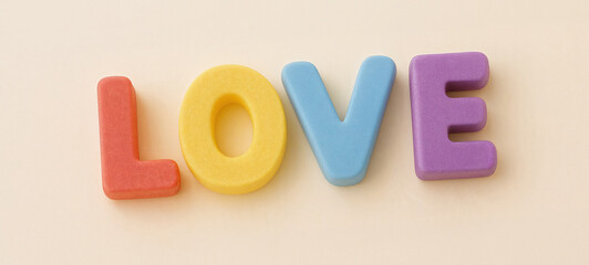 Colorful marshmallow-style LOVE letters on soft pastel background, ideal for Valentine’s Day product placement, romantic branding, greeting cards, social media posts, lifestyle blogs and playful visua