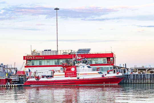 New-York, USA - 6.12.2025: Marine fire station marine 9 with fdny fireboat in New York harbor.