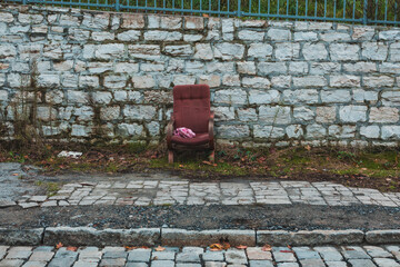 brown chair in the street