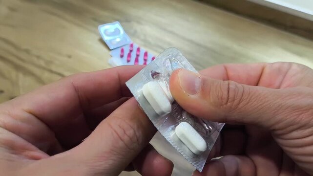 Removing a Pill from Blister Pac
