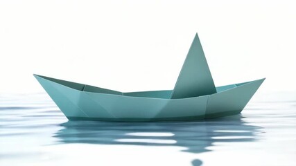 A tiny blue paper boat floating in a serene ocean scene with a soft horizon line.