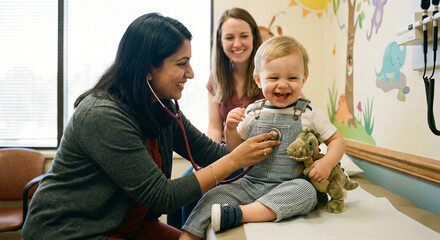 doctor examining baby