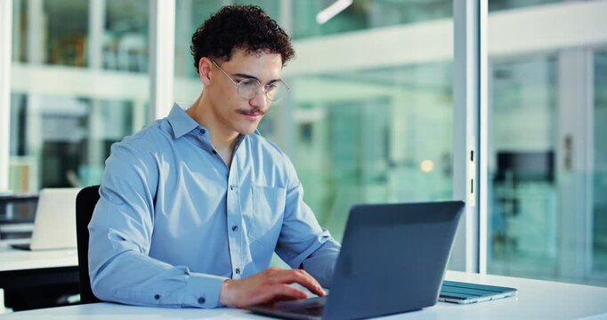Man, laptop an typing at office with smile, solution or risk management with glasses at company. Person, broker or consultant with computer, feedback and review for project report at insurance agency