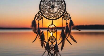 an image of a dream catcher at sunset
