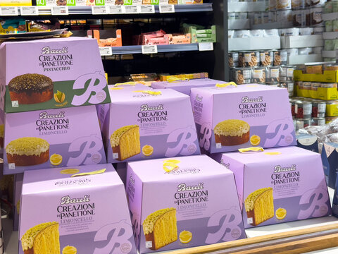 Villach, Austria - December 10, 2025: Colorful display of Bauli Creazioni Panettone boxes in a grocery store, showcasing festive packaging and tempting flavors for holiday celebrations