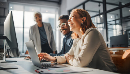 A team collaborates in a bright modern office, sharing ideas and enjoying a positive, productive work environment in a inclusive setting.