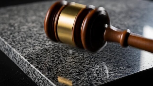 Gavel on Granite: Justice, Law, and Legal Proceedings Concept