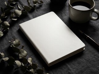 Fototapeta premium Blank white notebook with coffee and plant
