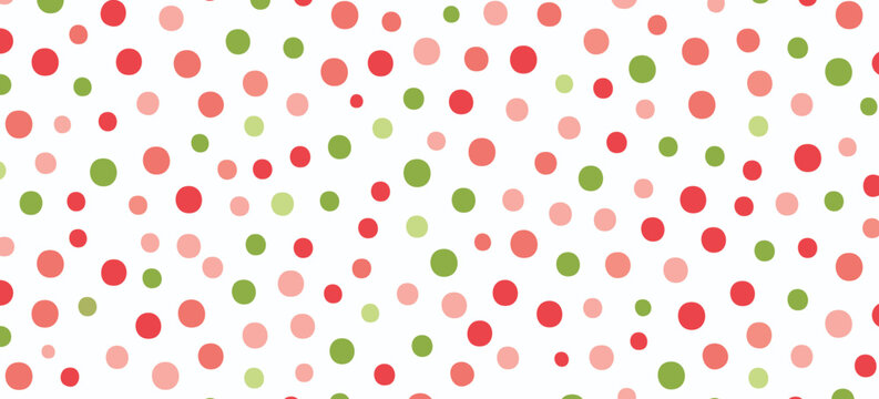 Christmas confetti vector seamless pattern. Colorful pastel confetti trendy background. Polka dots print in pink, green, red colors on Xmas, birthday, party. Holiday wrapping paper.

