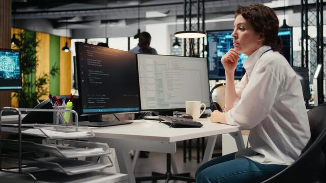 Cheerful technician working in office, using specialized hardware to accelerate complex AI calculations. Upbeat IT expert managing systems for machine learning training datasets, camera A