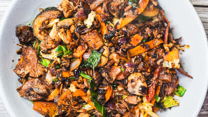 Smoking hot shredded lamb served in a bowl with mixed vegetables, ready to eat. Tender, juicy, and perfectly seasoned. Ideal for Middle Eastern rice dishes, wraps, or a hearty stand-alone meal.