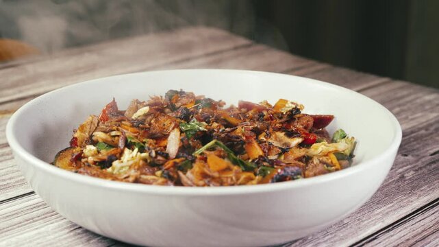 Smoking hot shredded lamb served in a bowl with mixed vegetables, ready to eat. Tender, juicy, and perfectly seasoned. Ideal for Middle Eastern rice dishes, wraps, or a hearty stand-alone meal.