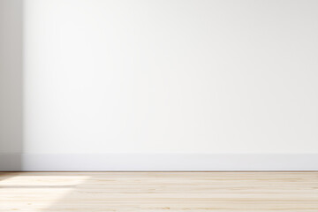 Naklejka premium Bright empty room with light wooden flooring and a plain white wall, ideal as a clean mockup background for interior design
