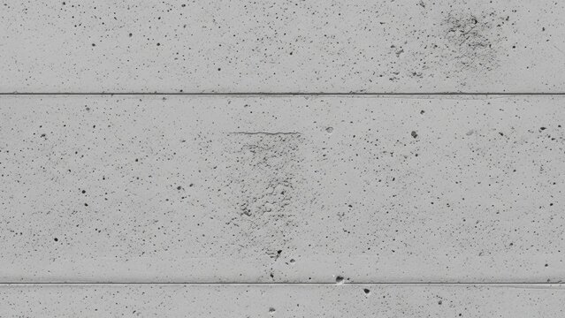 Detailed surface of raw gray industrial concrete wall featuring horizontal formwork joints and rough, porous texture.