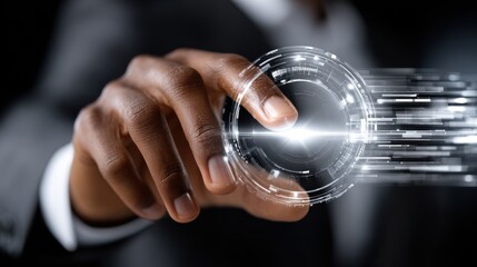 A man is holding a computer mouse and pointing at a glowing circle