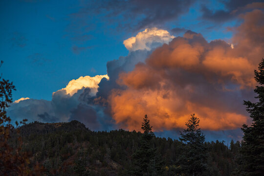 mountain clouds at sunset with dramatic color