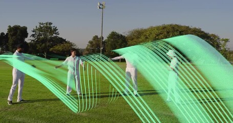 Four athletes swinging on cue for training then bending with green ribbons flowing around them - Powered by Adobe