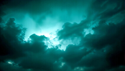 Obraz premium Dramatic sky with deep teal clouds