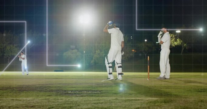 Cricket bowler bowling, batsman playing shot defending wicket, overlays crossing players with flare