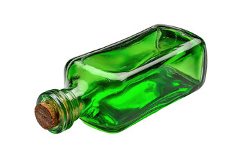 Green glass bottle lies, corked, against a black backdrop