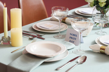 Elegant table setting for Nobel prize day with clean plates, closeup