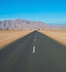empty asphalt road Sossusvlei, Namibia