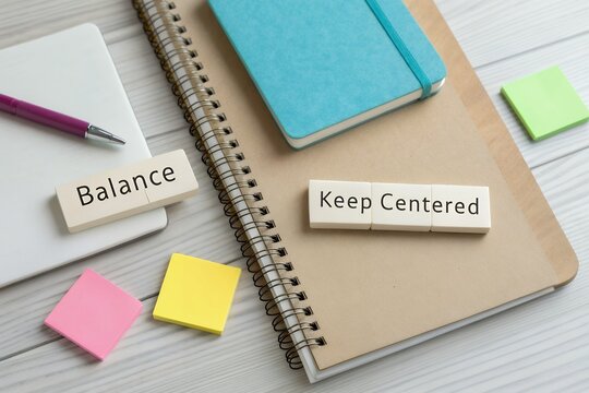 Notebooks and sticky notes with motivational words for planning - Powered by Adobe
