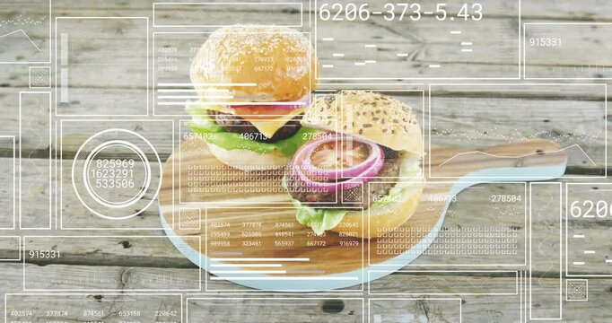 HUD scanning camera pulling back and panning burgers holding center on board showing product