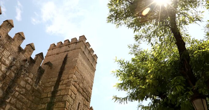 Morning view of the mid evil castle fortifications in Seville, Andalusia, Spain.