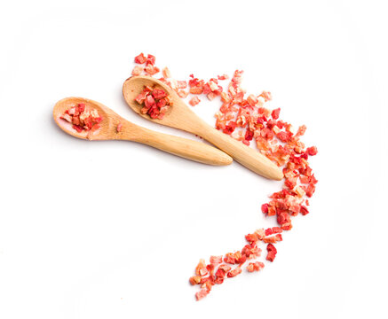 pieces of a spoon with dried strawberries