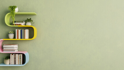 Colourful floated rainbow shelf with book and potted plant on green wall in a living room or library © bongkarn