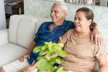 Happy senior couple showing true love at home