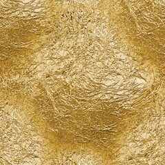 Textured gold foil background with reflective shimmer
