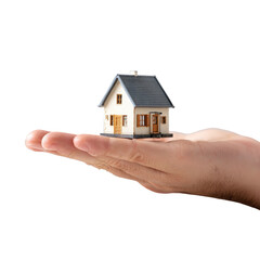 Tiny house on hand, isolated. Black background. Simple