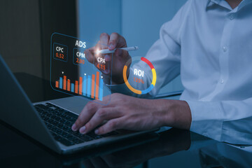 Focused professional does marketing analysis and seo technology for startup branding and business growth on virtual screen